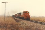 Loaded coal train rolls east